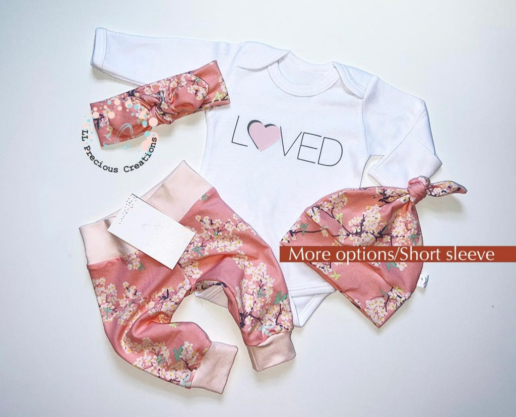 Pink Cherry Blossom floral baby girl outfit LOVED 
#llpreciouscreations #babygirloutfit #newbornoutfit #cominghomeoutfit #loved #newbornbabygirl #babyshowergift #babygift #newbornclothes #handmade 